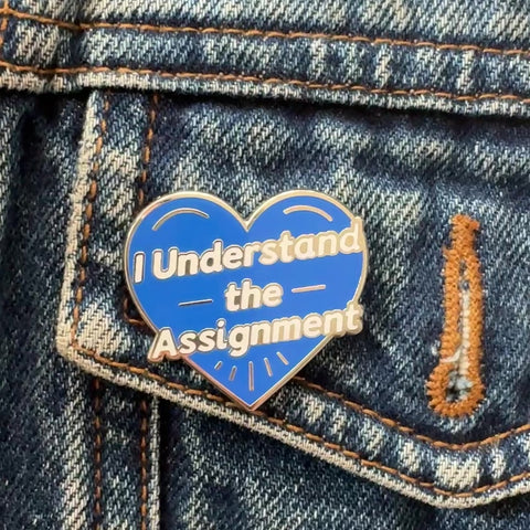 "I Understand the Assignment 💙" Enamel Pin